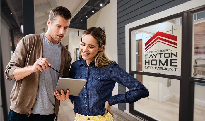 Two people reviewing a document.
